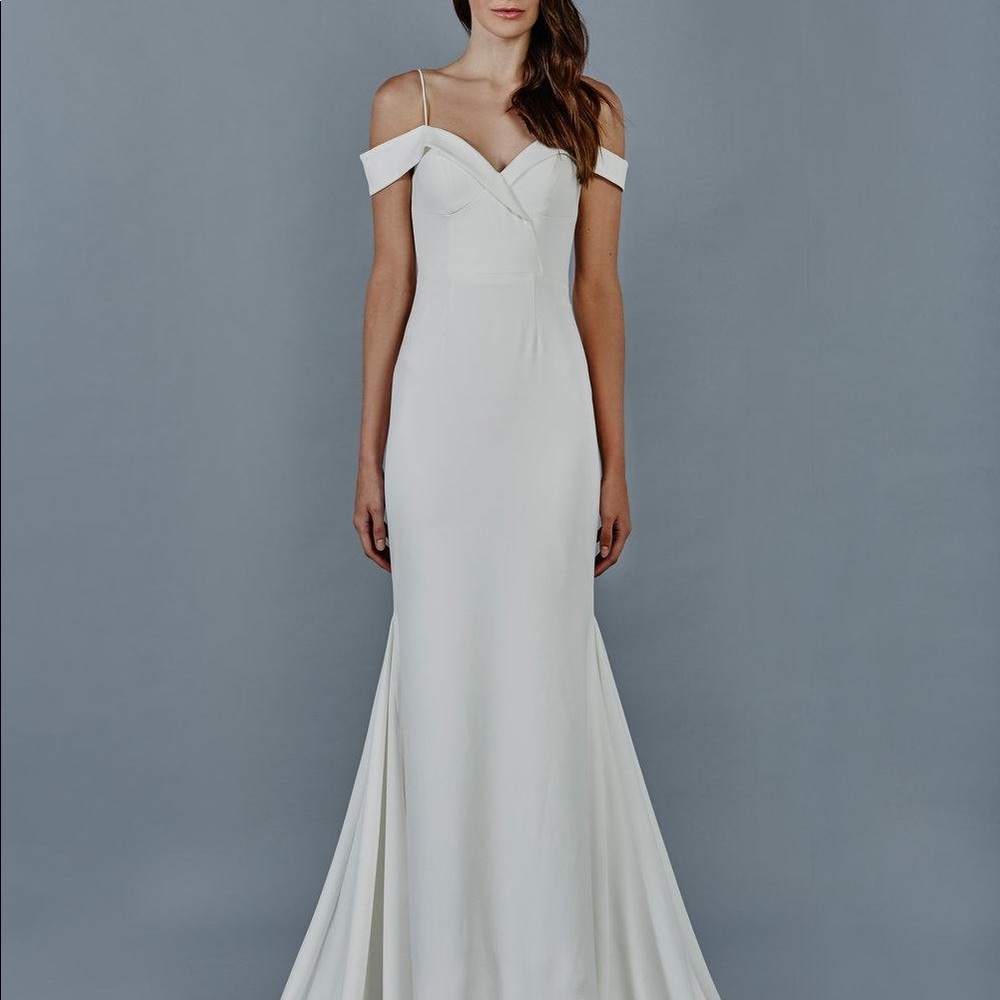 Brand New!! Unworn wedding dress size 0 unaltered!